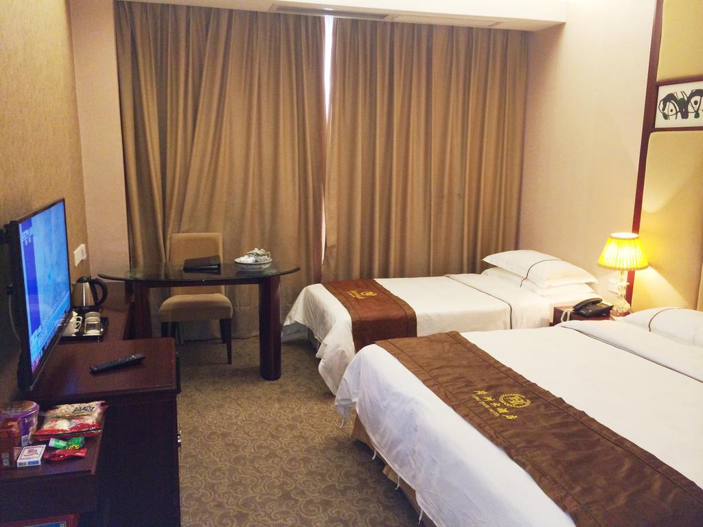 Long Zhou Grand Hotel قوانغتشو الغرفة الصورة
