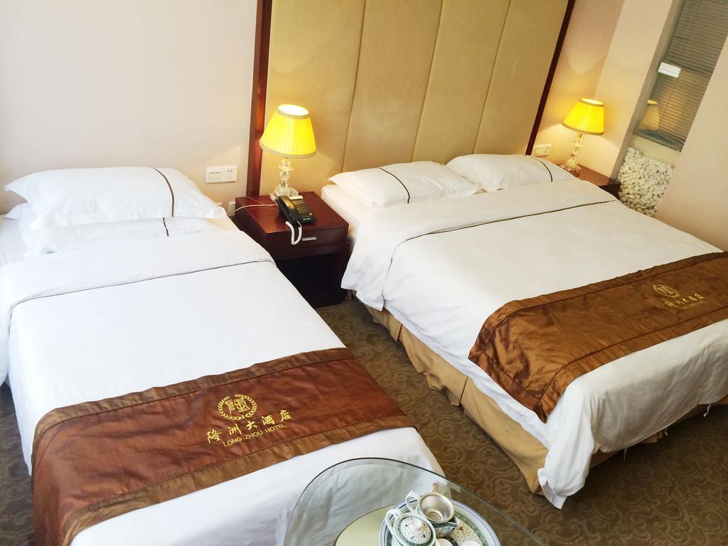 Long Zhou Grand Hotel قوانغتشو الغرفة الصورة