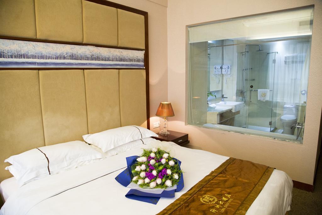 Long Zhou Grand Hotel قوانغتشو الغرفة الصورة