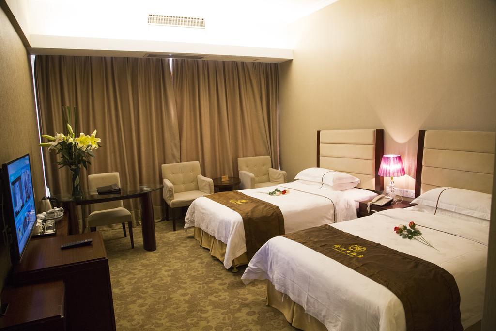 Long Zhou Grand Hotel قوانغتشو الغرفة الصورة