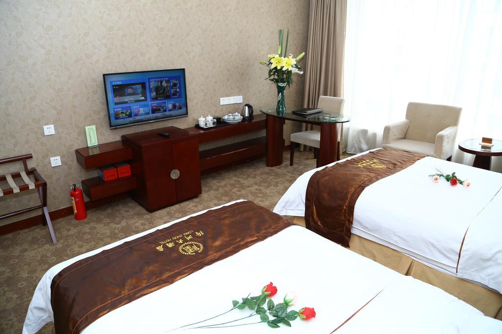 Long Zhou Grand Hotel قوانغتشو الغرفة الصورة