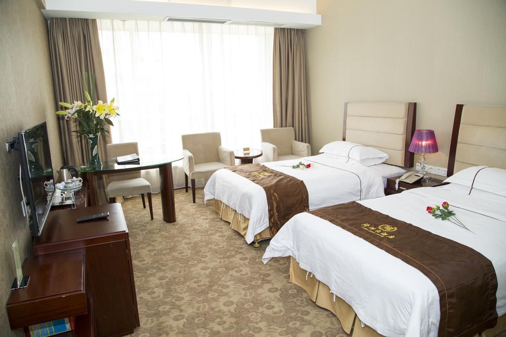 Long Zhou Grand Hotel قوانغتشو الغرفة الصورة