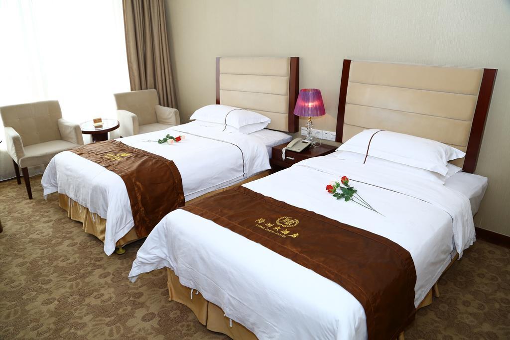 Long Zhou Grand Hotel قوانغتشو الغرفة الصورة